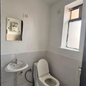 Bathroom in 1 RK Apartment at Microtek Greenburg, Sector 86 – for Sale