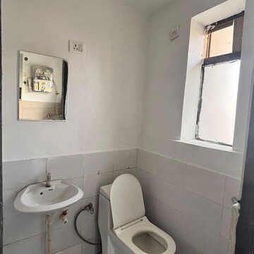 Bathroom in 1 RK Apartment at Microtek Greenburg, Sector 86 – for Sale