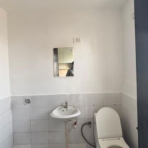 Bathroom in 1 RK Apartment at Microtek Greenburg, Sector 86 – for Sale