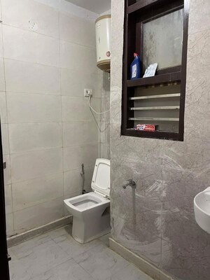 Bathroom in 1 BHK Builder Floor at Freedom Fighters Enclave – for Rent
