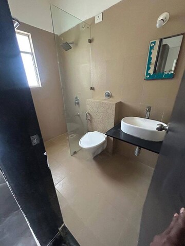 Bathroom in 3 BHK Apartment at Kolte Patil Tuscan Estate, Kharadi – for Rent