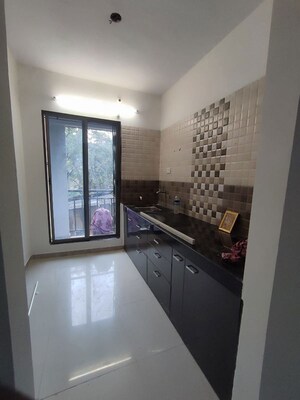 Kitchen in 1 BHK Apartment at Puranik Aarambh, Ghodbunder Road – for Rent