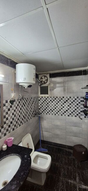 Bathroom in 3 BHK Apartment at Saya Gold Avenue, Vaibhav Khand – for Rent