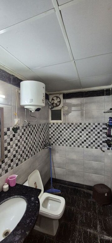 Bathroom in 3 BHK Apartment at Saya Gold Avenue, Vaibhav Khand – for Rent