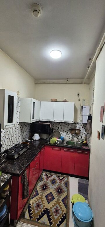 Kitchen in 3 BHK Apartment at Saya Gold Avenue, Vaibhav Khand – for Rent