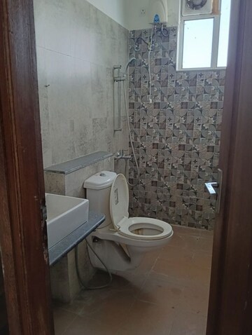 Bathroom in 4 BHK Apartment at Dhakoli – for Sale