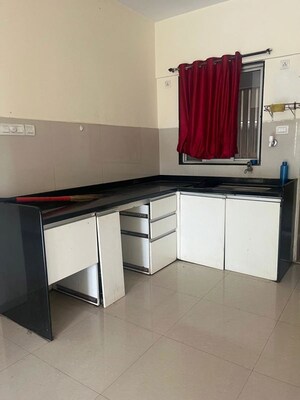 Kitchen in 2 BHK Apartment at ARP River Crest, Bhugaon – for Sale