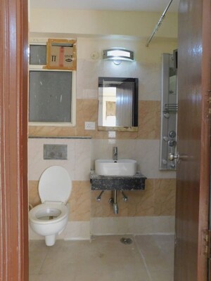 Bathroom in 2 BHK Apartment at MCC Signature Heights, Raj Nagar Extension – for Rent