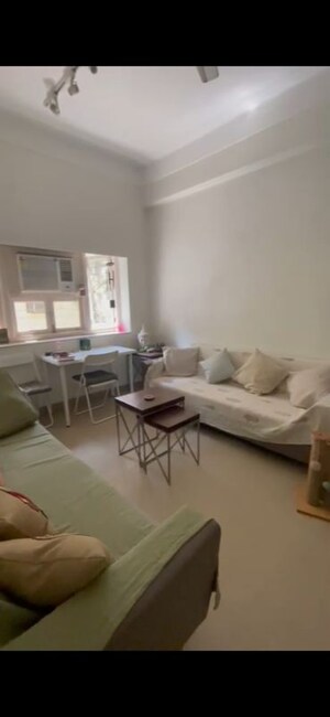 Living Room in 1 BHK Apartment at Khar West – for Rent