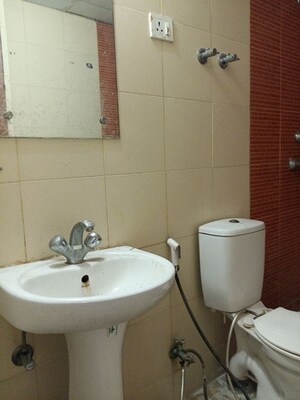 Bathroom in 3 BHK Apartment at Mahagun Mywoods, Sector 16c Greater Noida – for Rent