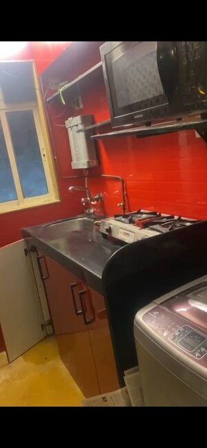 Kitchen in 1 BHK Apartment at Lilly Apartments, Bandra West – for Rent