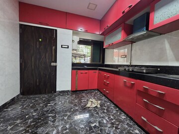 Kitchen in 3 BHK Apartment at Unnat Nagar CHS, Goregaon West – for Rent