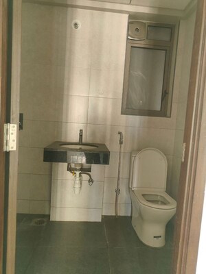 Bathroom in 3 BHK Apartment at Kalpataru The Sunrise, Kolshet Road – for Rent