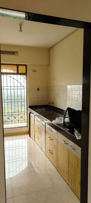 Kitchen in 2 BHK Apartment at Abrol House, Malad West – for Rent