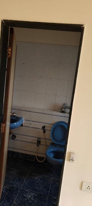 Bathroom in 2 BHK Apartment at Abrol House, Malad West – for Rent