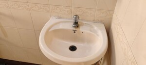 Bathroom in 2 BHK Apartment at Abrol House, Malad West – for Rent