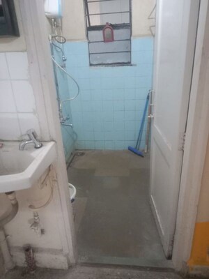 Bathroom in 2 BHK Apartment at Janki Heights, Aundh – for Rent