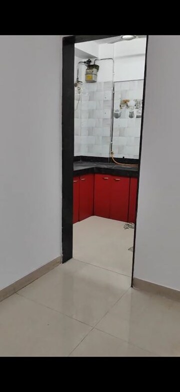 Kitchen in 2 BHK Apartment at Mandalik Nagar CHS, Malad West – for Rent