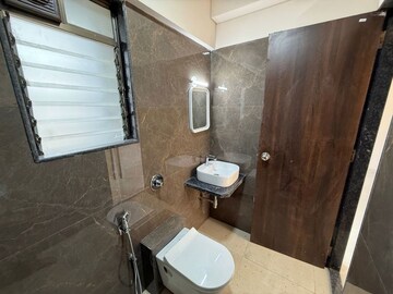 Bathroom in 1 BHK Apartment at Ajmera Shikhar, Malad West – for Rent