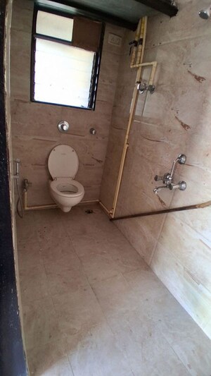 Bathroom in 2 BHK Apartment at DGS Sheetal Bhavan, Malad East – for Rent