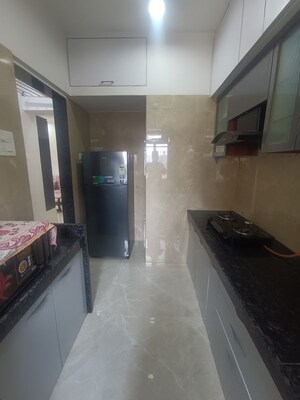 Kitchen in 2 BHK Apartment at Nakul Raj , Malad West – for Rent