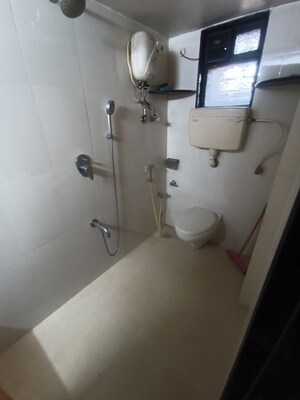Bathroom in 3 BHK Apartment at Girnar Galaxy Apartment, Malad West – for Rent