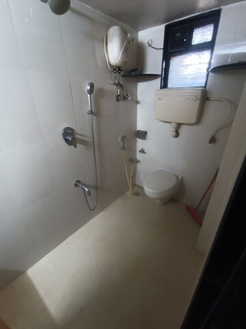 Bathroom in 3 BHK Apartment at Girnar Galaxy Apartment, Malad West – for Rent
