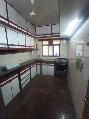 Kitchen in 3 BHK Apartment at Girnar Galaxy Apartment, Malad West – for Rent