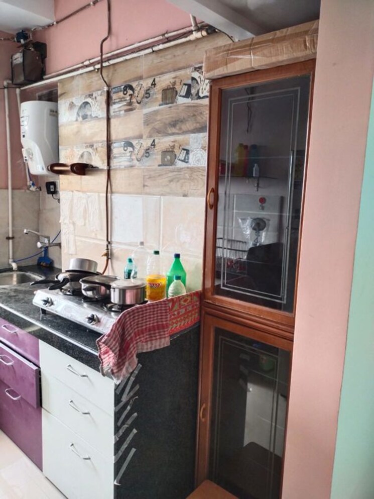 Kitchen, vakratunda-adityamaan 2 Bedroom 900 Sq.Ft. Apartment In Jb Nagar Mumbai 9810633