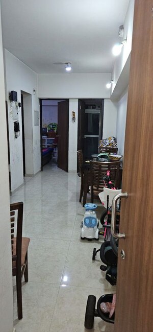 Living Room in 1 BHK Apartment at Lodha Amara, Kolshet Road – for Sale