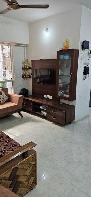 Living Room in 1 BHK Apartment at Lodha Amara, Kolshet Road – for Sale