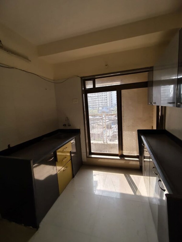 Kitchen, conwood-astoria 1 Bedroom 507 Sq.Ft. Apartment In Goregaon East Mumbai 9810669