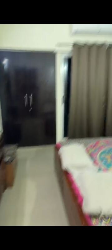 Bedroom in 2 BHK Apartment at Grihapravesh, Sector 77 – for Rent