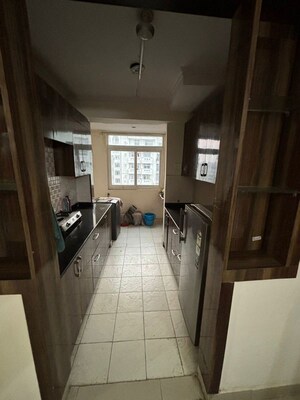 Kitchen in 2.5 BHK Apartment at Amrapali Silicon City, Sector 76 – for Rent
