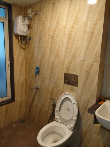 Bathroom in 1 BHK Apartment at Lodha Amara, Kolshet Road – for Rent