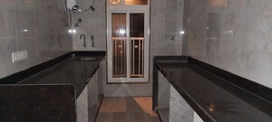 Kitchen in 2 BHK Apartment at Zee Ashtavinayak, Andheri West – for Sale