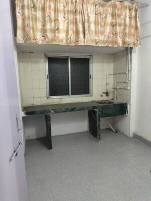 Kitchen in 1.5 BHK Apartment at Baburao Dhore Bhavan, Old Sangvi – for Rent