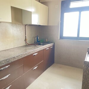 Kitchen in 1.5 BHK Apartment at Runwal Forests, Datar Colony – for Sale