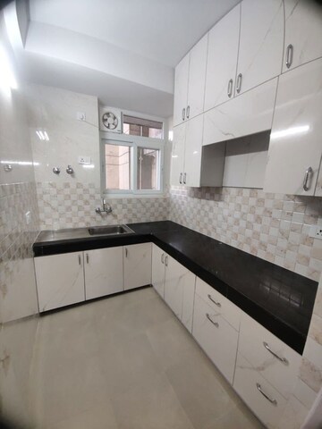 Kitchen in 2 BHK Builder Floor at Mahagun Mezzaria, Sector 78 – for Rent