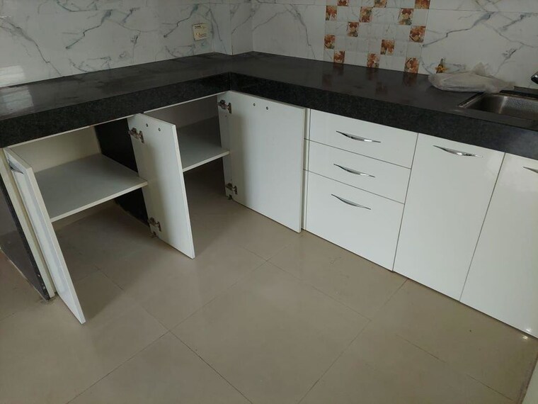 Kitchen, the-chatterjee-the-crown-greens 2 Bedroom 900 Sq.Ft. Apartment In Hinjewadi Pune 9811008