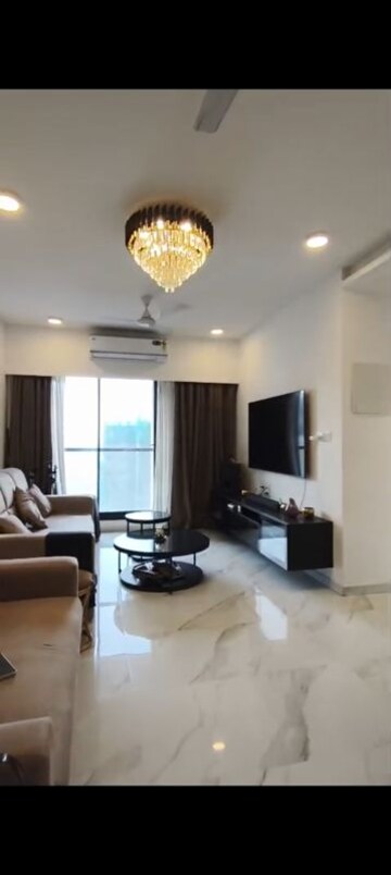 Living Room in 2 BHK Apartment at Dev Leo Tower, Oshiwara – for Rent