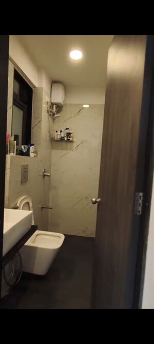 Bathroom in 2 BHK Apartment at Dev Leo Tower, Oshiwara – for Rent