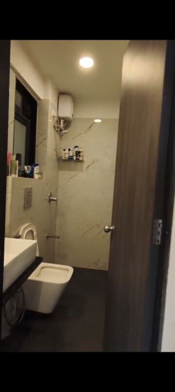 Bathroom in 2 BHK Apartment at Dev Leo Tower, Oshiwara – for Rent