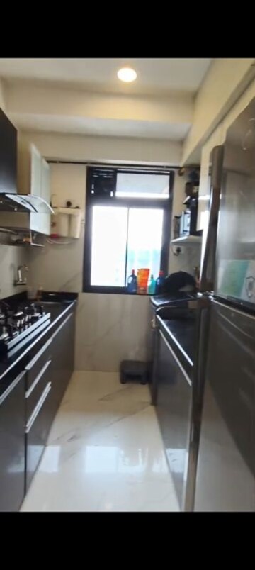Kitchen in 2 BHK Apartment at Dev Leo Tower, Oshiwara – for Rent
