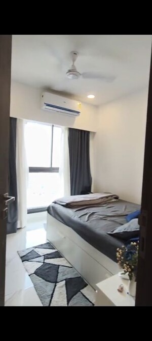 Bedroom in 2 BHK Apartment at Dev Leo Tower, Oshiwara – for Rent