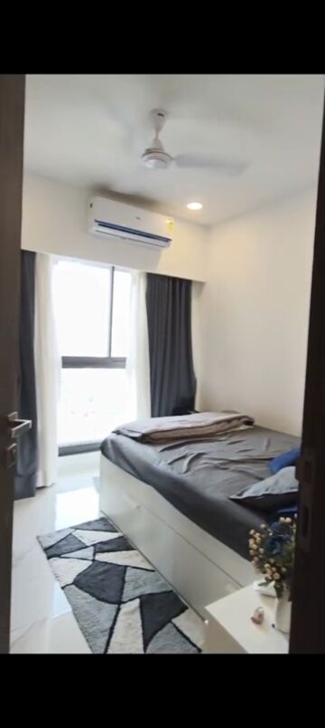 Bedroom in 2 BHK Apartment at Dev Leo Tower, Oshiwara – for Rent