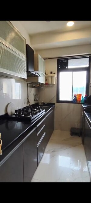 Kitchen in 2 BHK Apartment at Dev Leo Tower, Oshiwara – for Rent