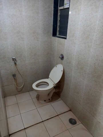 Bathroom in 2 BHK Apartment at Dahanukar Colony – for Sale