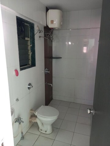 Bathroom in 2 BHK Apartment at Dahanukar Colony – for Sale