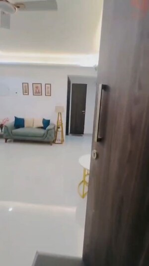 Living Room in 2 BHK Apartment at Dev Leo Tower, Oshiwara – for Rent